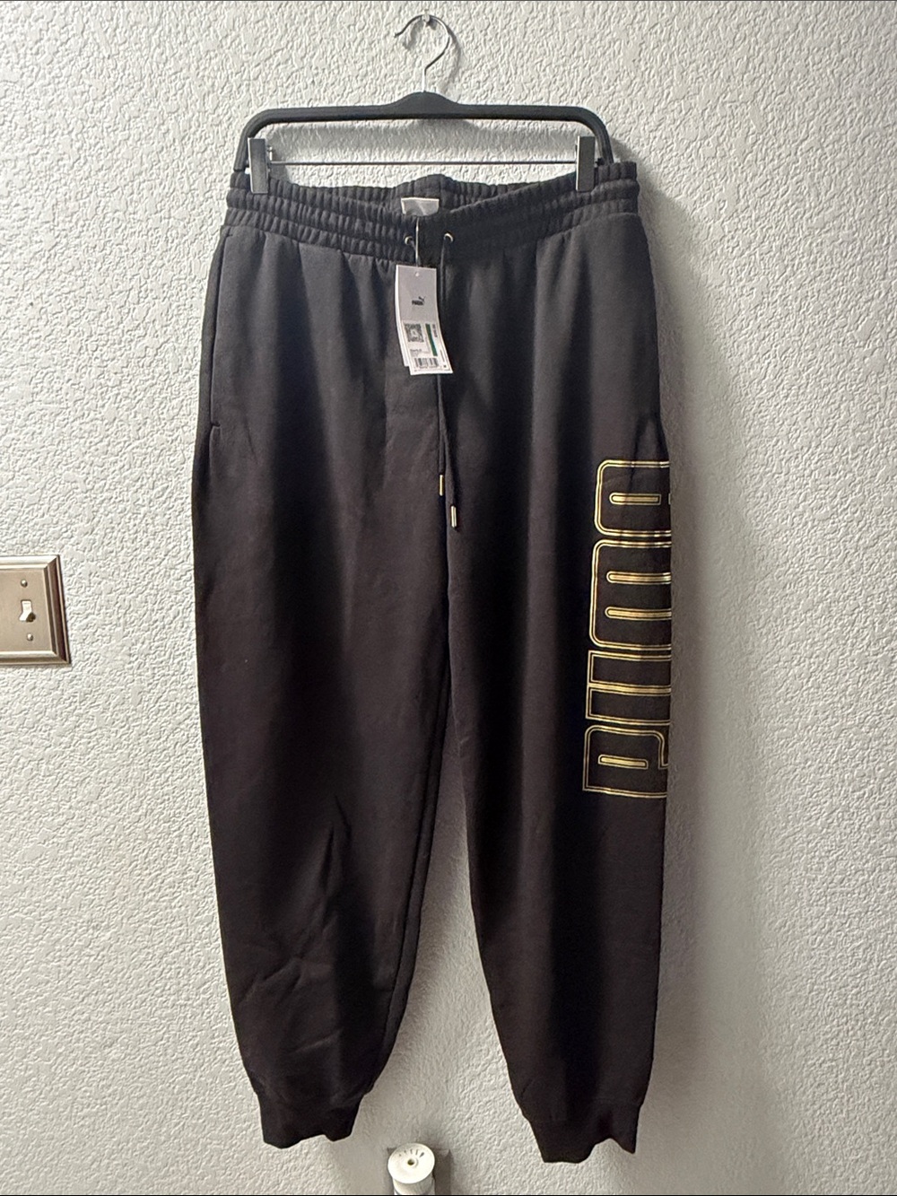 Puma Men's Black Jogger Sweatpants with Gold Logo